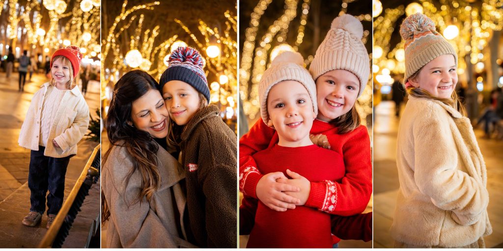 Children smiling beneath the Christmas lights in Palma